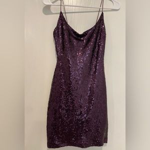 New purple homecoming mini dress! Has purple sequins and straight neckline! 3/4